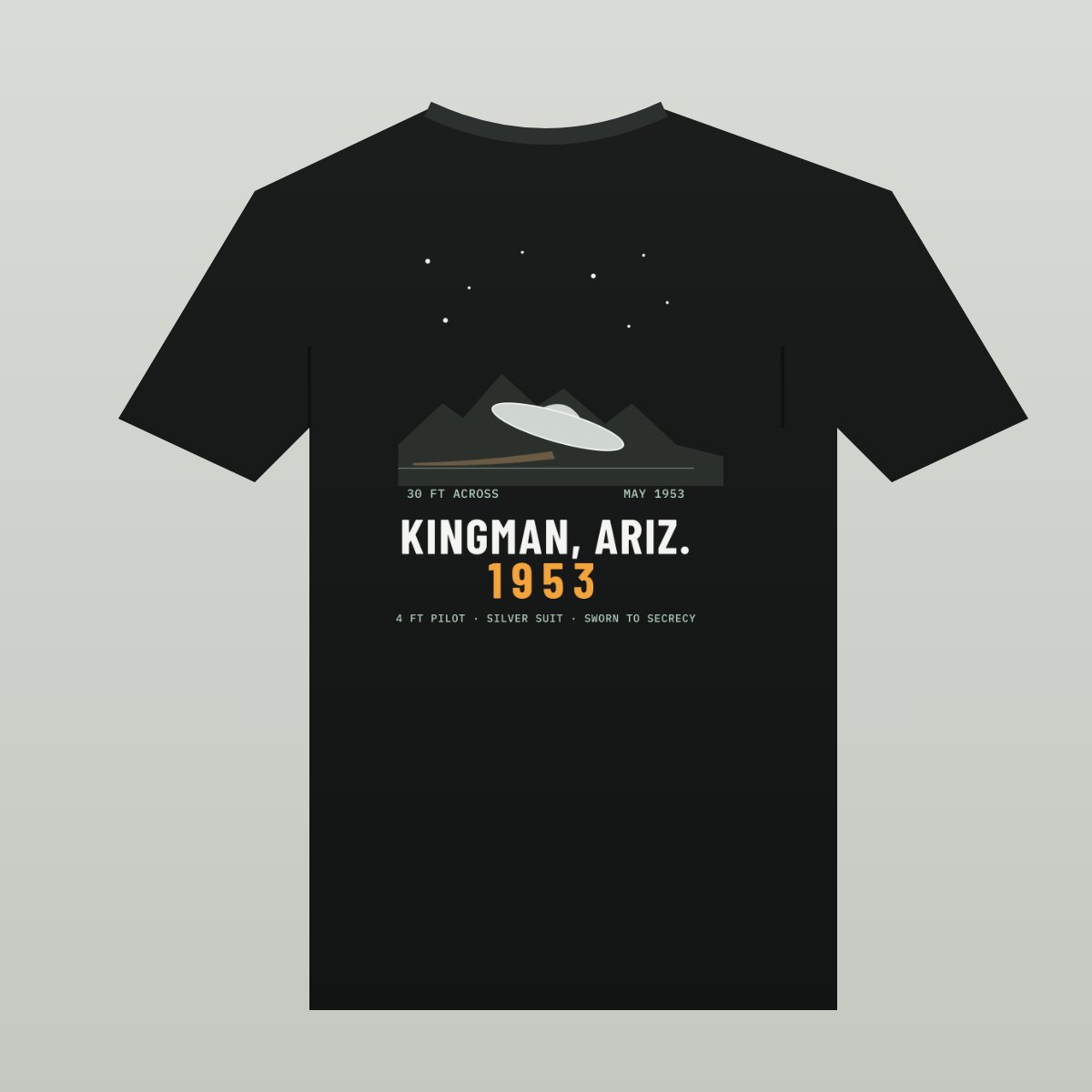 Black tee with a silver saucer tilted into a desert ridge under stars, over KINGMAN, ARIZ. 1953